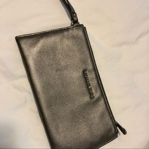 Michael Kors silver wristlet. Gently used